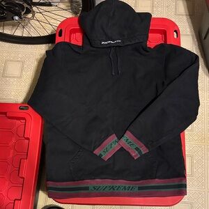 Supreme Black Hoodie with Red and Green Details